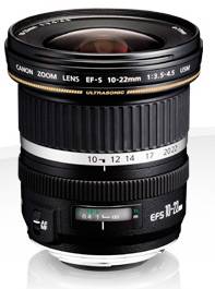 Fotografski objektiv z napisom 'Canon Zoom Lens EF-S 10-22mm f/3.5-4.5 USM'. Gre za širokokotni zoom objektiv.