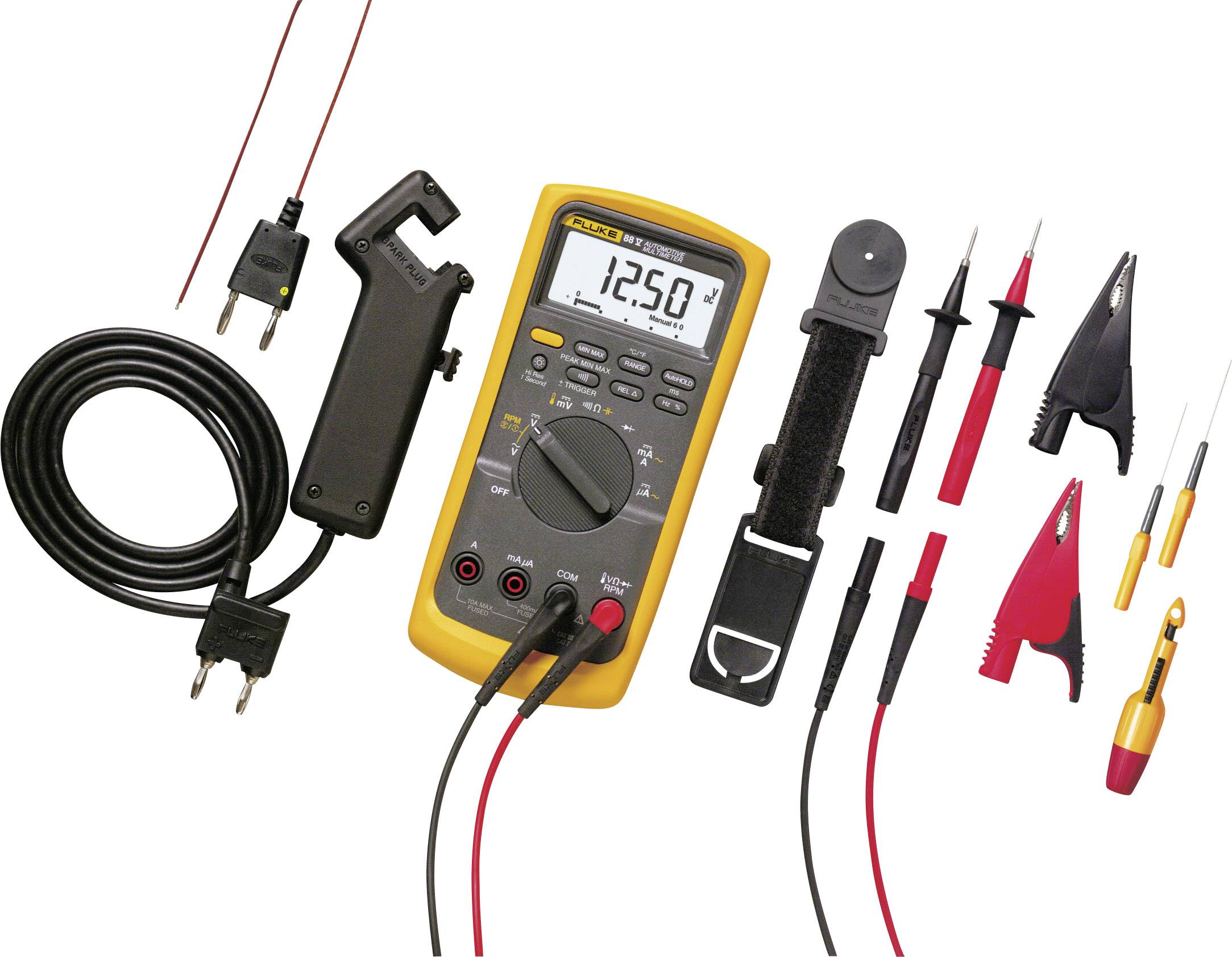 Multimeter v rumeni ohišju s črnimi merilnimi kabli in dodatno opremo. Zaslon prikazuje '12.50'.