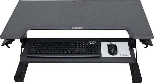 Namizni dodatek v črni barvi z integrirano odlagalno Surface za tipkovnico. Na površini ležita črna tipkovnica in miška.
