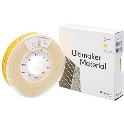 Rumena tuljava materiala Ultimaker poleg bele kartonske embalaže z napisom 'Ultimaker Material'.