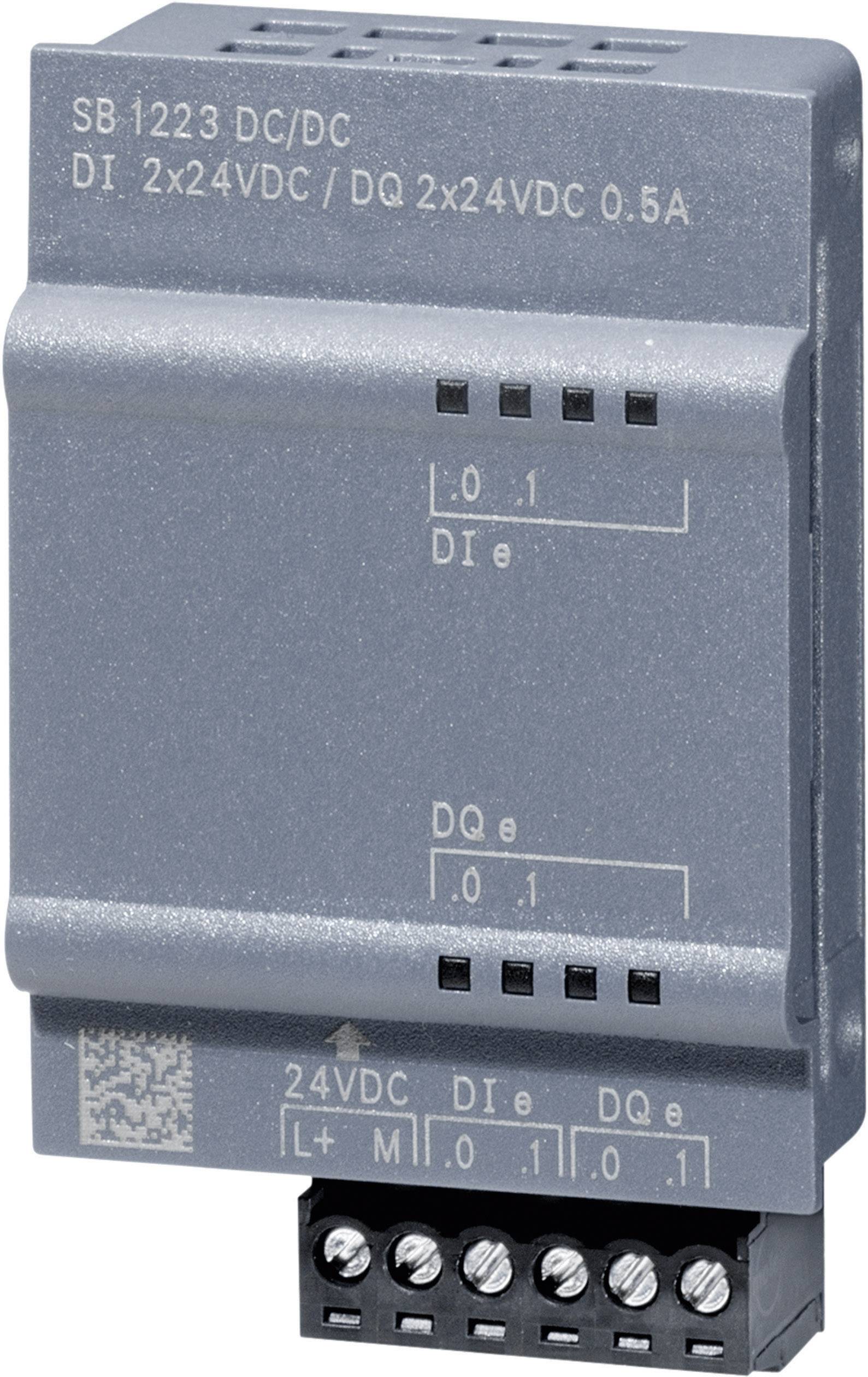 Siva industrijska enota z napisom 'SB 1223 DC/DC DI 2x24VDC / DQ 2x24VDC 0.5A'. Na spodnji strani ima priključke.