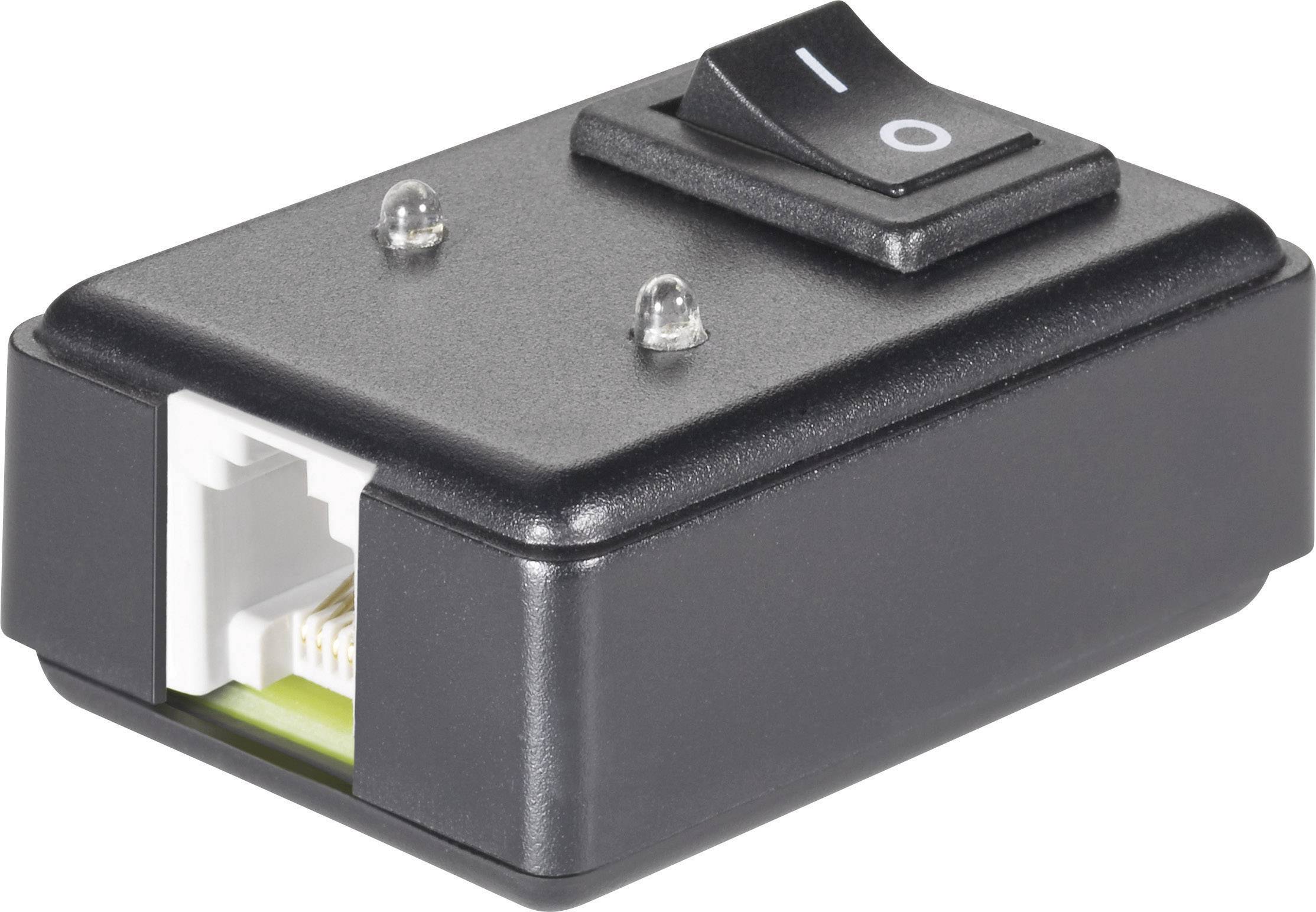 Majhen črn omrežni stikalni element z vklopnim stikalom in dvema LED indikatorjema. Na strani ima priključek RJ-45 za omrežje.