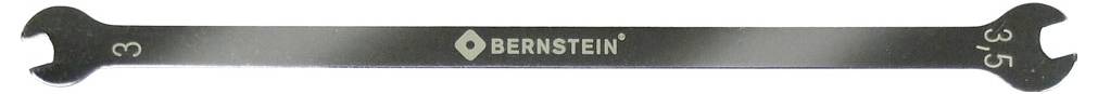 Ett metallverktyg med öppna skruvnyckelhuvuden på båda sidor, märkt 'BERNSTEIN'. Ändarna är märkta med storlekarna '3' och '3,9'.