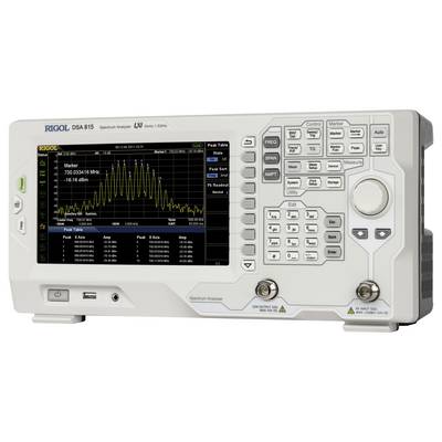 Spektrumanalysator med digitalt display visar frekvensanalys. Många knappar och en stor skärm med grafisk visning.