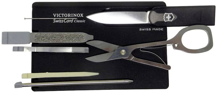 En svart 'Victorinox SwissCard Classic' innehåller en liten sax, en kniv, nagelfilar, pincett, tandpetare och penna.