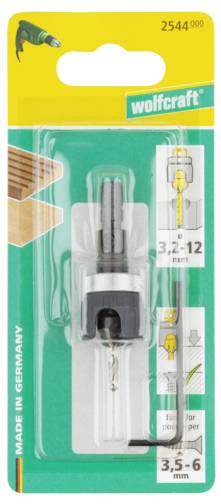 Förpackning av ett Wolfcraft träborrset med träborr, djupbegränsare och insexnyckel, lämplig för borrning från 3,5-12 mm.