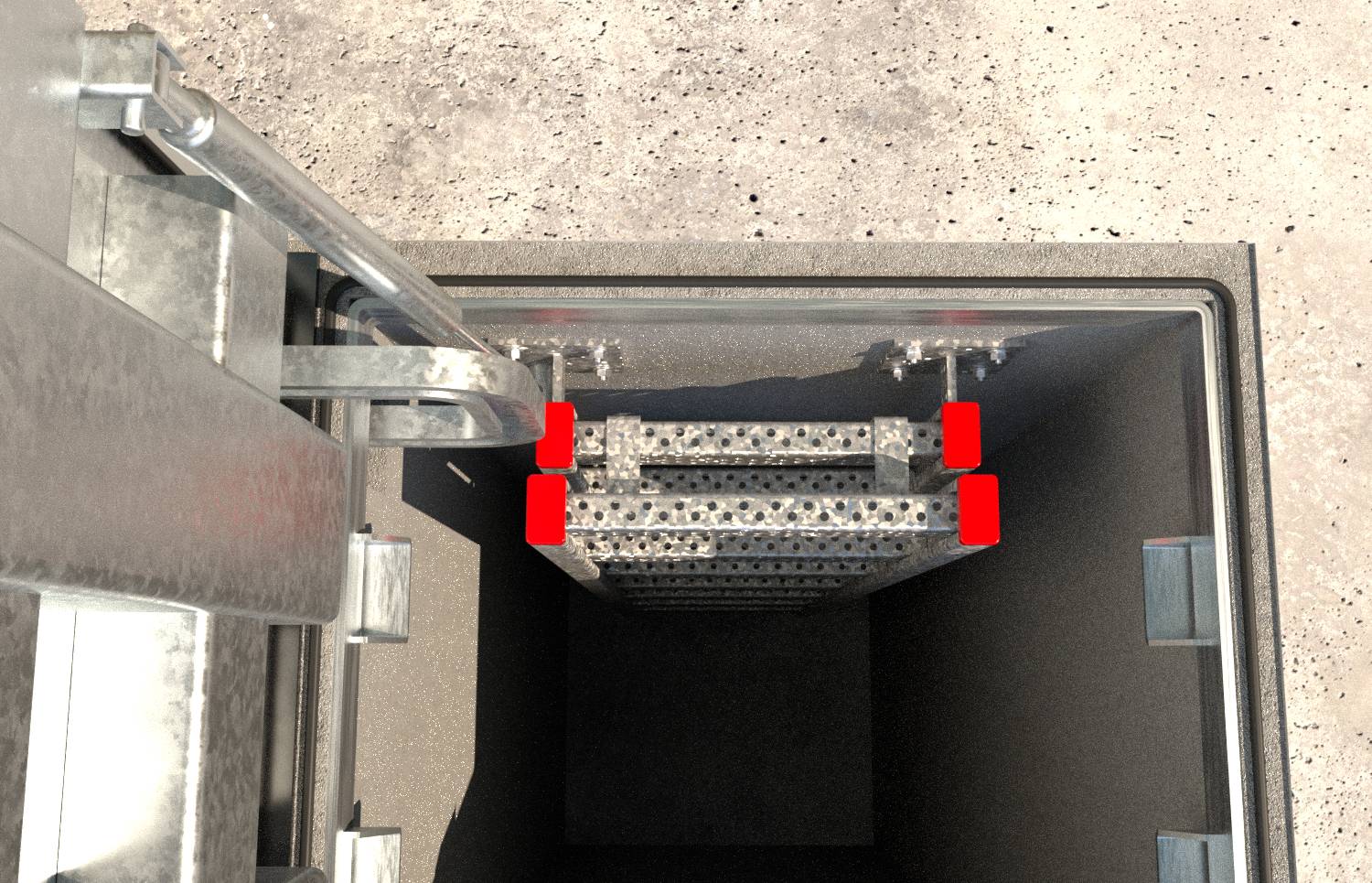 Uppifrån-neråtvy in i en öppen metallgrop eller användarschakt med en perforerad plattform och röda säkerhetsmärkningar nära öppningen.