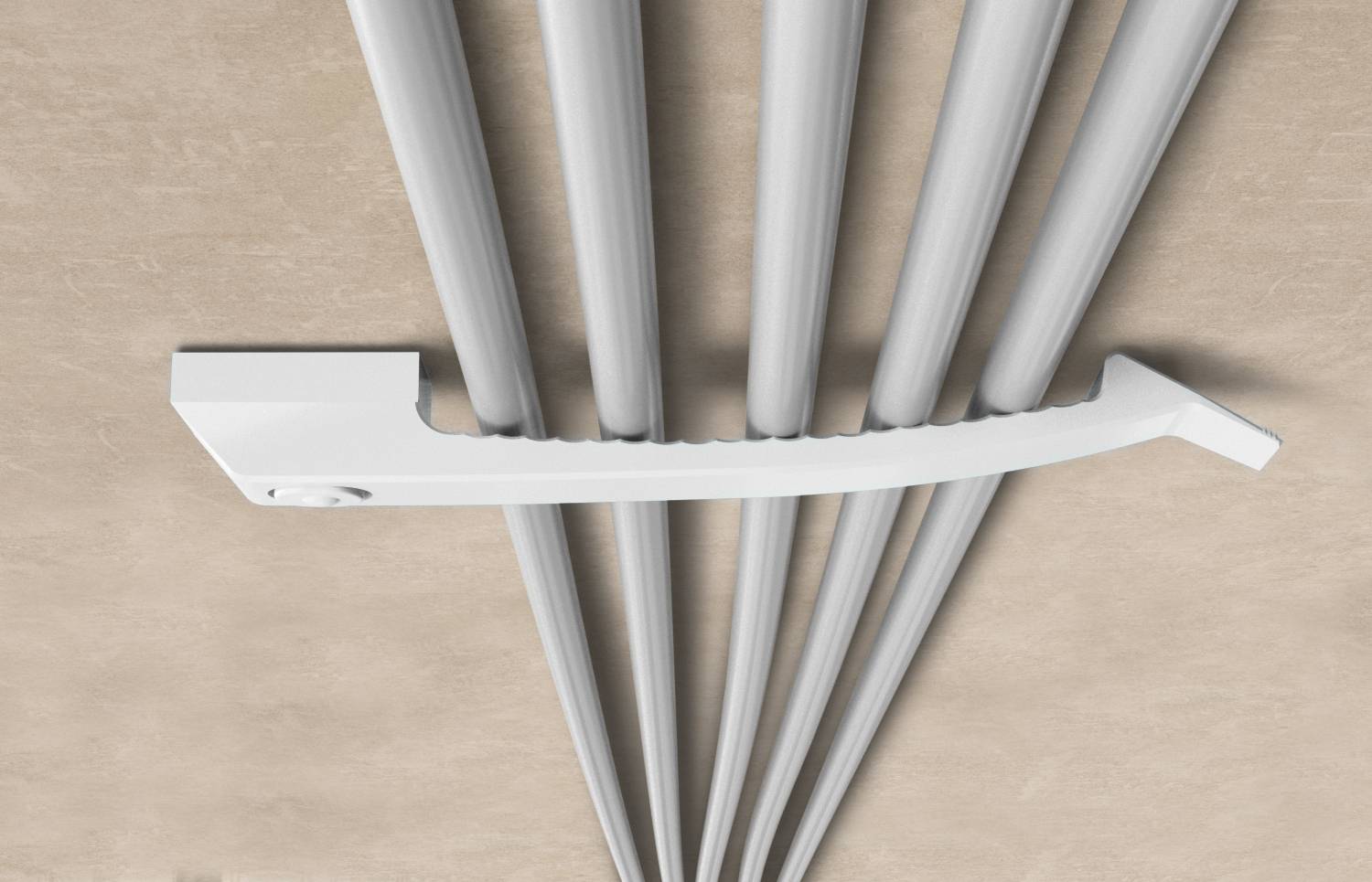 Vit plastikkabelklämma som fixerar flera grå kablar mot en beige vägg eller tak.
