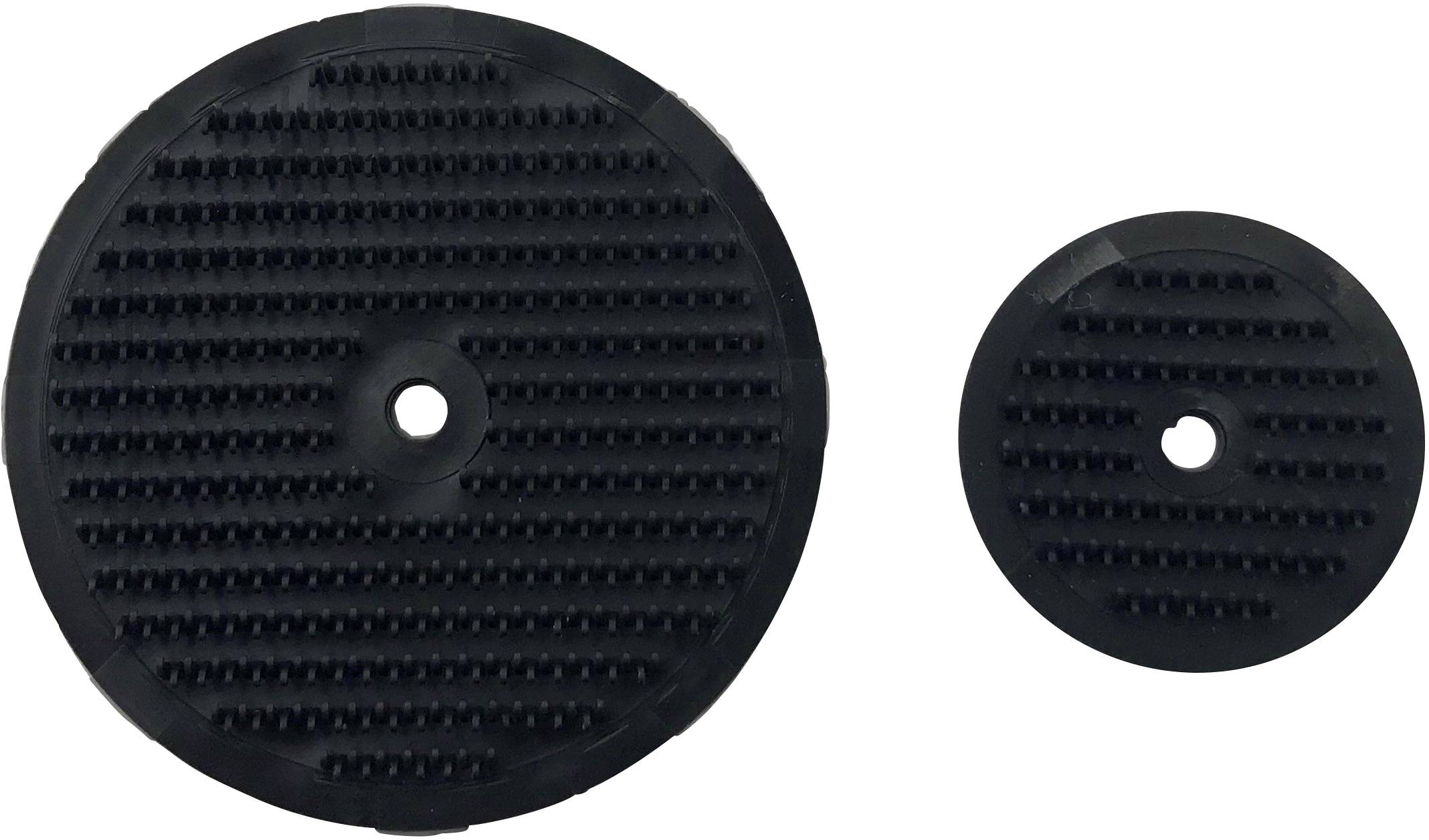Två svarta, runda gummidämpare med räfflad yta och centralt hål; stor och liten diameter.