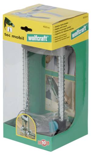 Förpackning till 'Wolfcraft Tec Mobil' med borrstöd, avbildad produkt, användningsfoton och varumärkesnamn, grön och gul design.