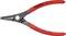 En röd Knipex-tång, modell 49 11 A1, med svart mittendel, lämplig för invändiga ringar från 10 till 25 mm, tillverkad i Tyskland.