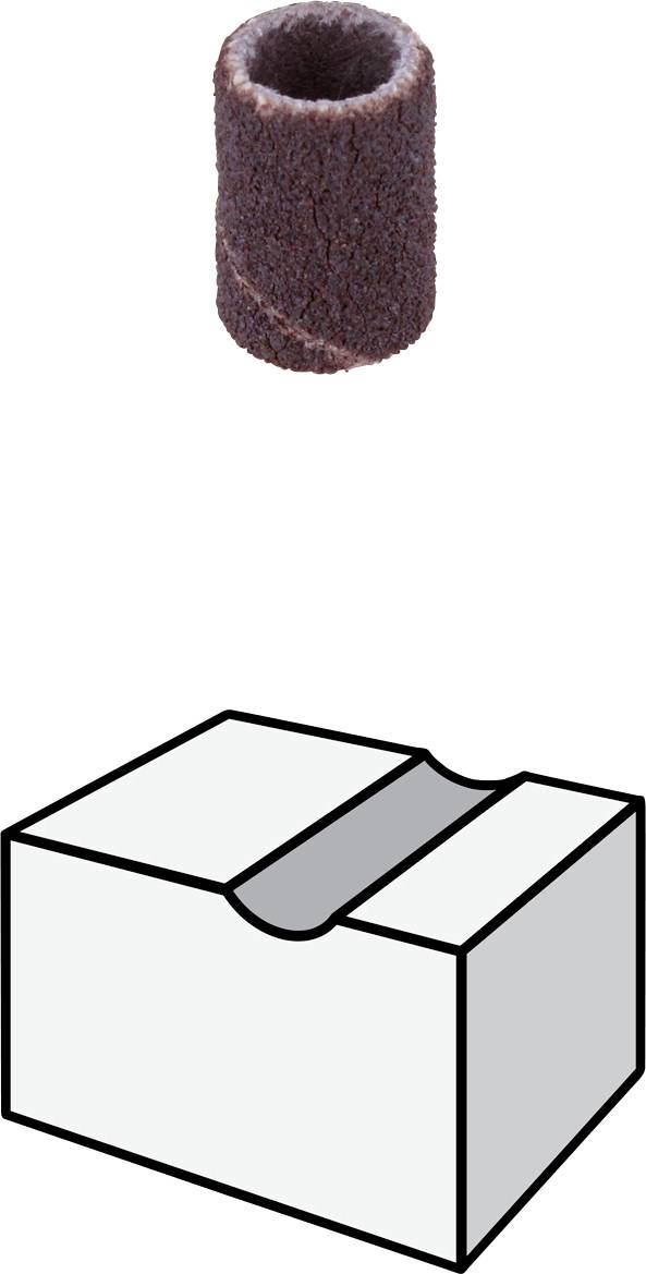 Ett slipband och en grå låda med ett spår, som sannolikt är avsett för att hålla bandet på plats.