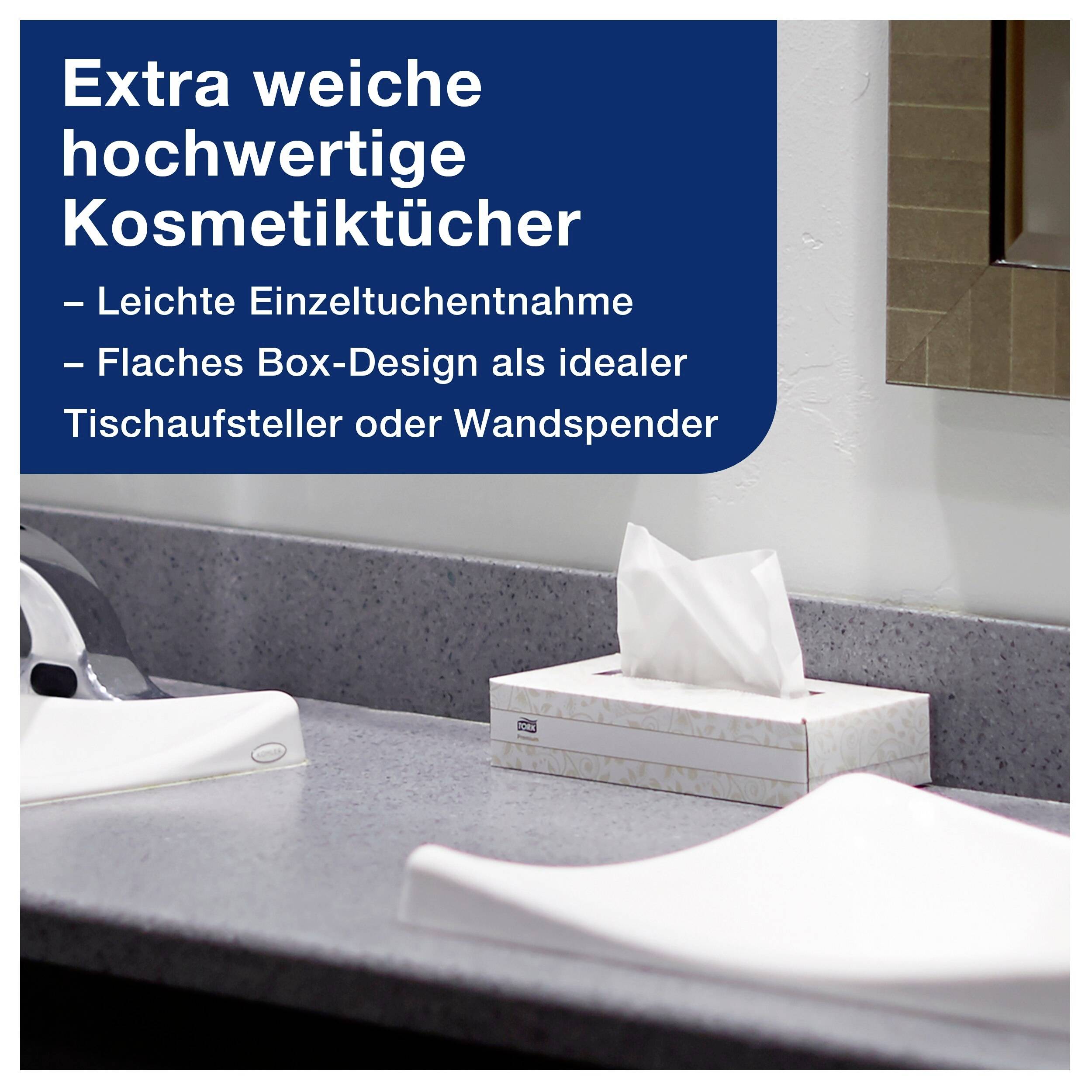 Extra mjuka kosmetiska våtservetter i en platt ask på ett handfat. Asken är designad för bordsdistribution eller väggmonterad dispenser.