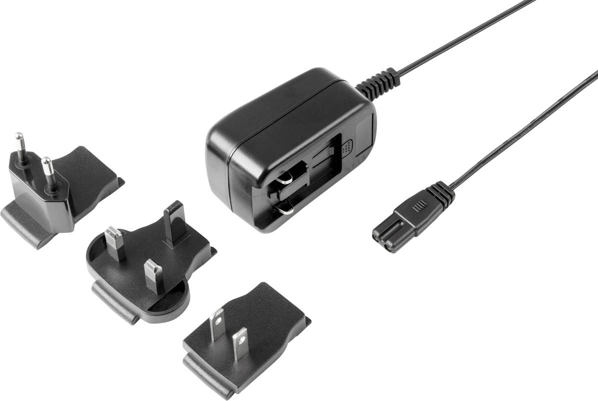 Svart nätadapter med fyra utbytbara kontakter för olika internationella eluttag.
