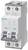 Tvåpolig säkringsautomат från Siemens. Vit, rektangulär form med vippströmbrytare och gröna indikatorer.
