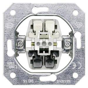 En elektronisk installation för en tryck-dimmer-mekanism. Fyrkapsligt metallhölje med centrala anslutningsklämmor för elektriska ledningar.
