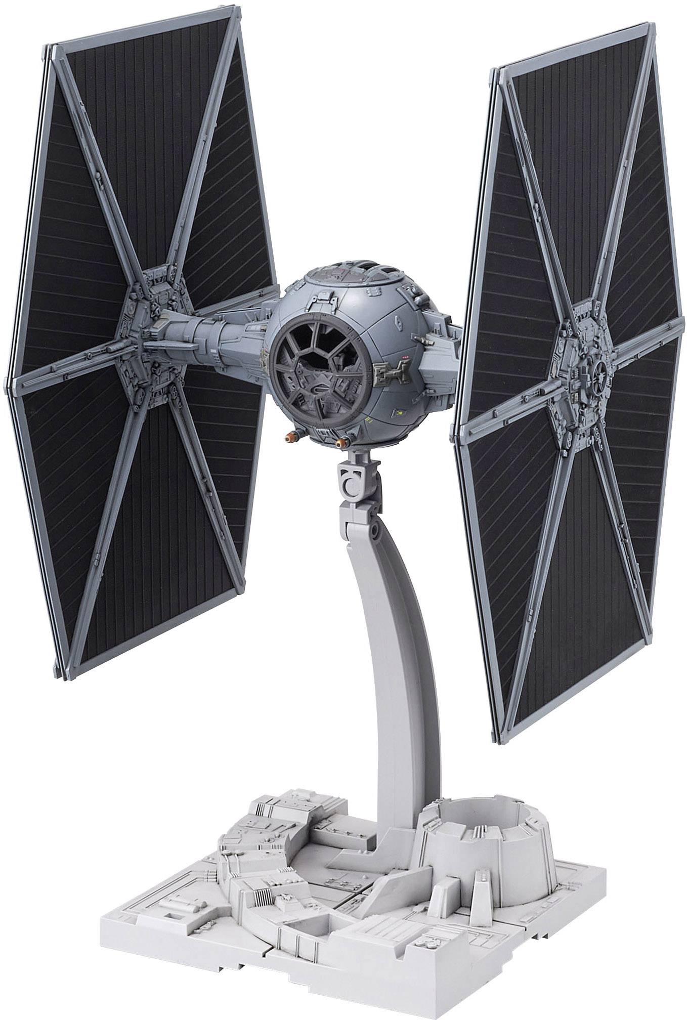 En modell av en TIE-jägare från Star Wars, monterad på ett transparent ställ, med detaljerade vingar och cockpit.