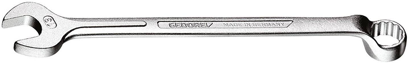 En silverfärgad skiftnyckel, öppen på båda sidor, med texten 'Germany Made in Germany'. Till vänster en gaffelnyckel, till höger en ringnyckeln.