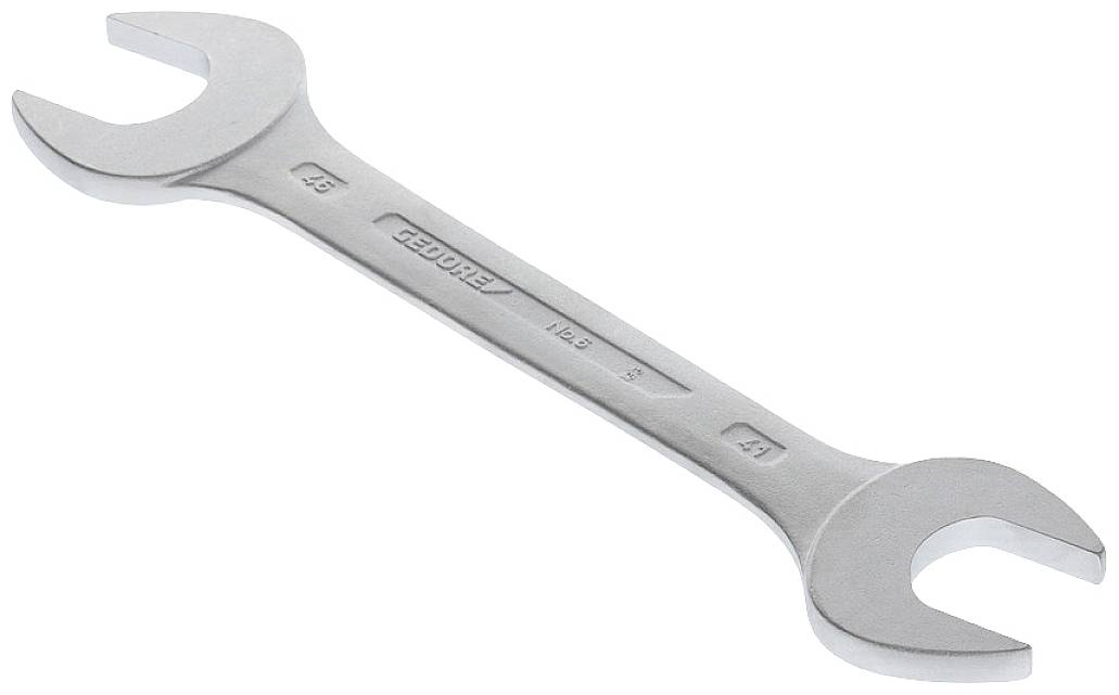 En silverfärgad kolvnyckel av krom-vanadin-stål med storleksangivelserna '15' och '17' vid ändarna.