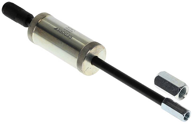 Ett metalliskt utdragningsverktyg med en lång, tunn skaft och ett cylindriskt handtag. En extra mutter ligger bredvid.