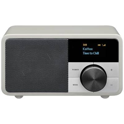 Digitalradio med grått hölje och svart högtalare. Display visar 'DAB', 'Koffee', 'Time to Chill'. Stor volymknapp.