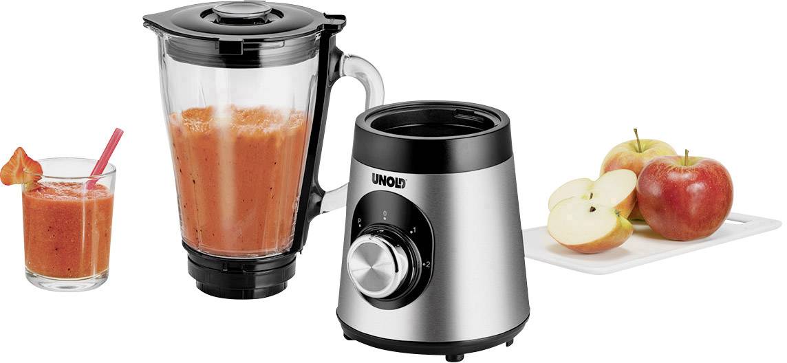 En juicepress med ett fullt glas röd juice och avskurna äpplen på en skärbräda. Perfekt för färska juicer.