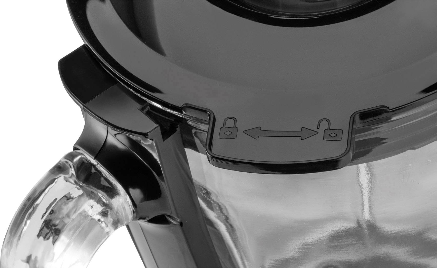 Låsmekanismen på en mixer visar ett låssymbol till vänster och höger med en dubbelpil däremellan.