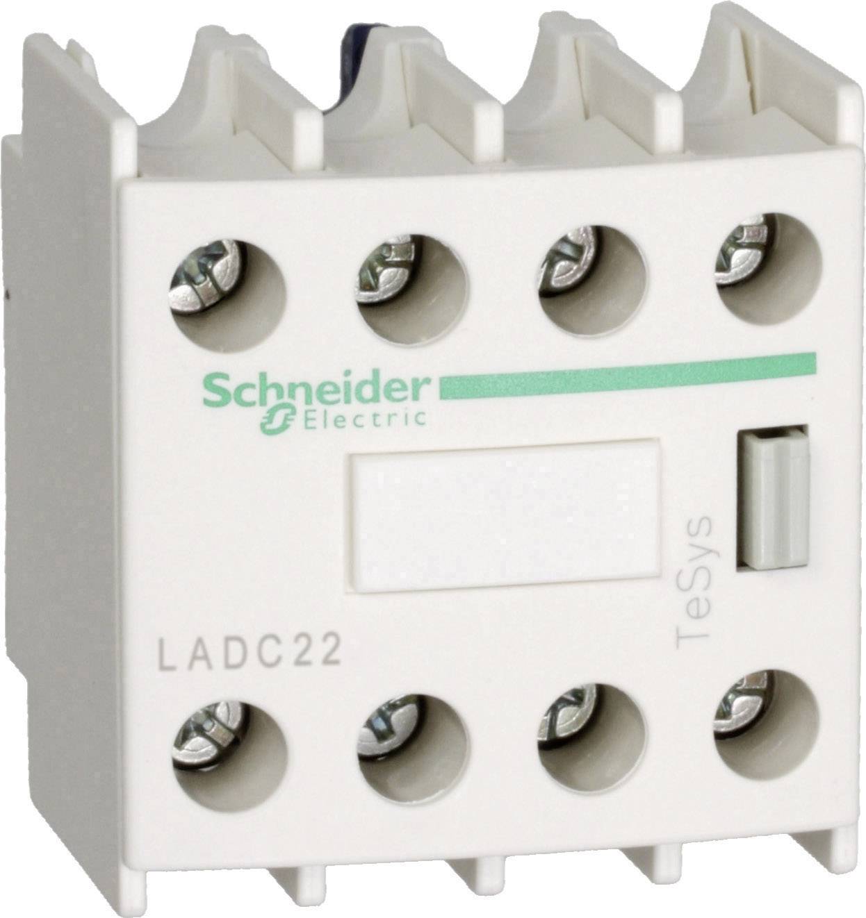 En vit, rektangulär elektrisk strömbrytare med tre skruvklämmor på ovansidan, Schneider Electric-logotypen och märkningen 'TeSys'.