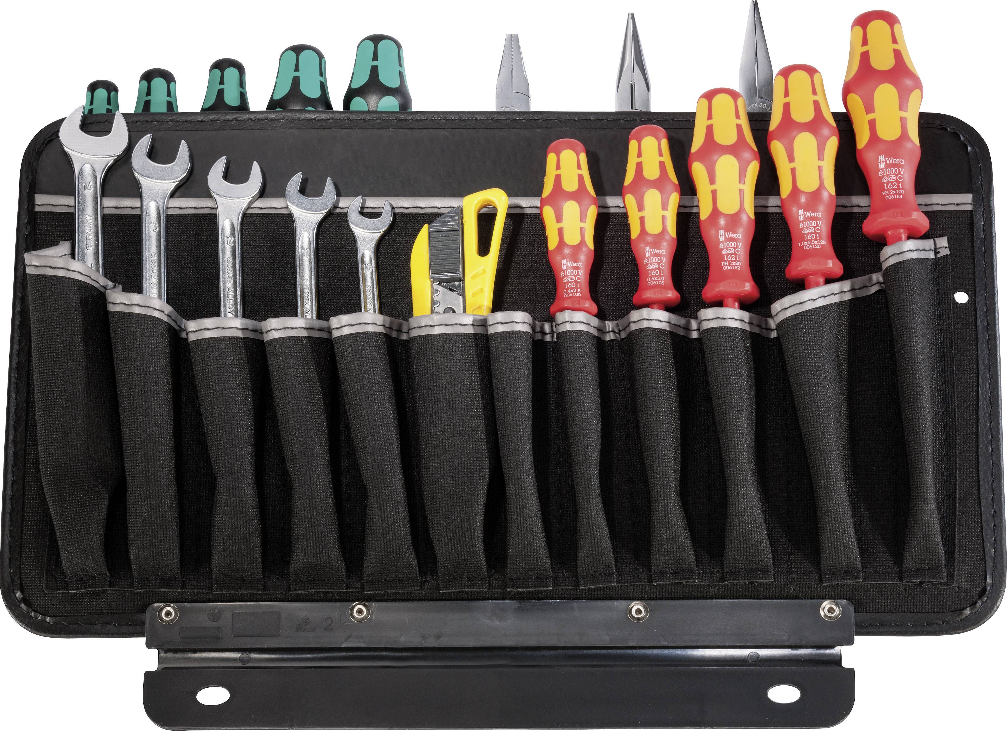 Ett öppet verktygsetui med olika skruvmejslar, skiftnycklar och en gul avbitare, prydligt arrangerade.