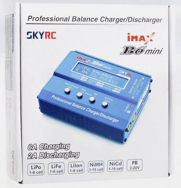 Blauer, professionell balanserad laddare/urladdare iMax B6 mini på vit förpackning. Stöder olika batterityper.