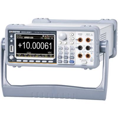 Ett digitalt multimeter med skärm visar mätvärdet '+10.00061 VDC'. Flera kontroller och anslutningar är synliga.