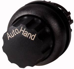 En svart vridknapp med påskriften 'Auto Hand', sannolikt för inställning mellan automatiskt och manuellt läge.