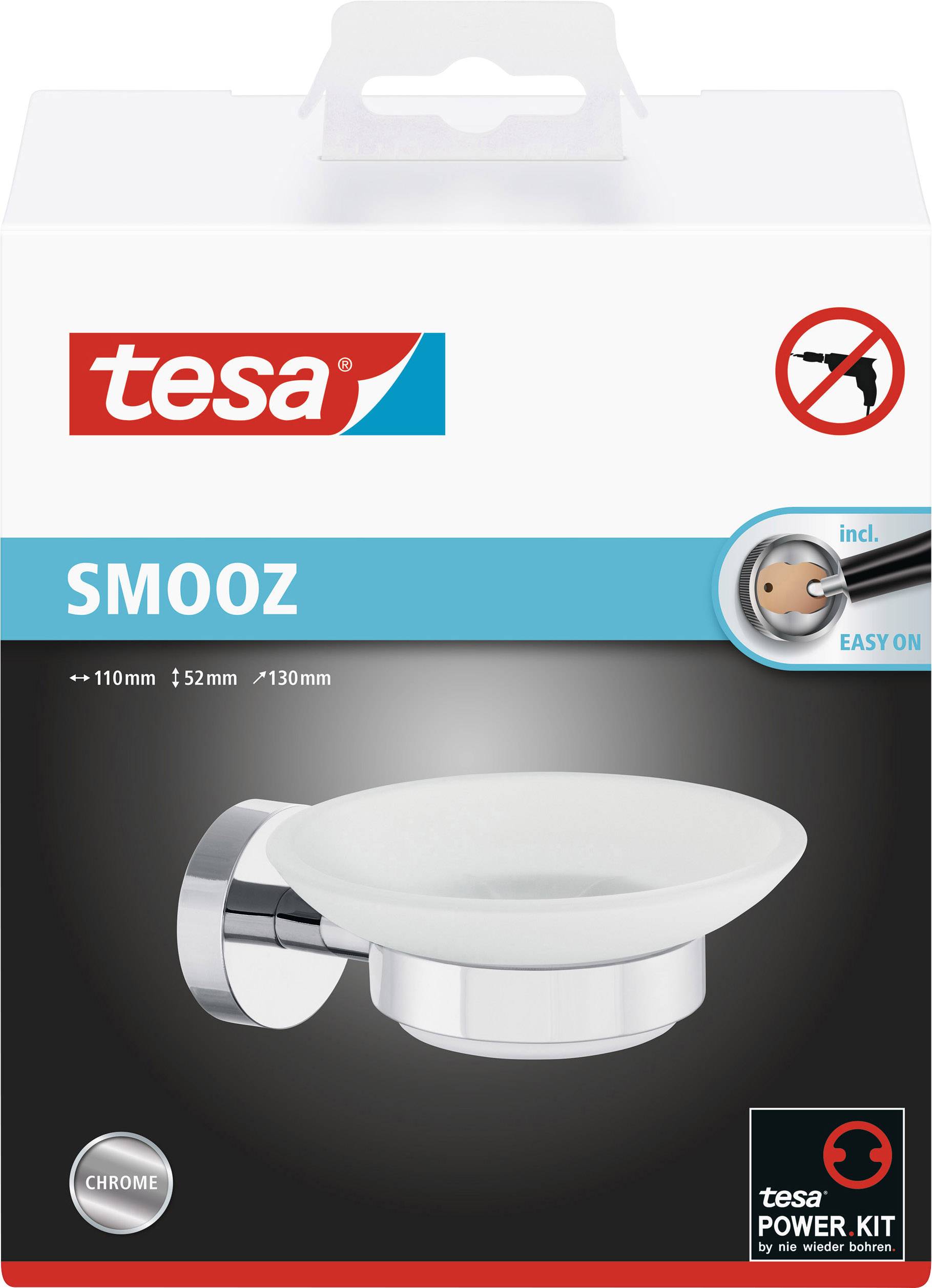 Förpackning för en tesa SMOOZ tvålkopp med monteringstillbehör, avbildad i krom-design.