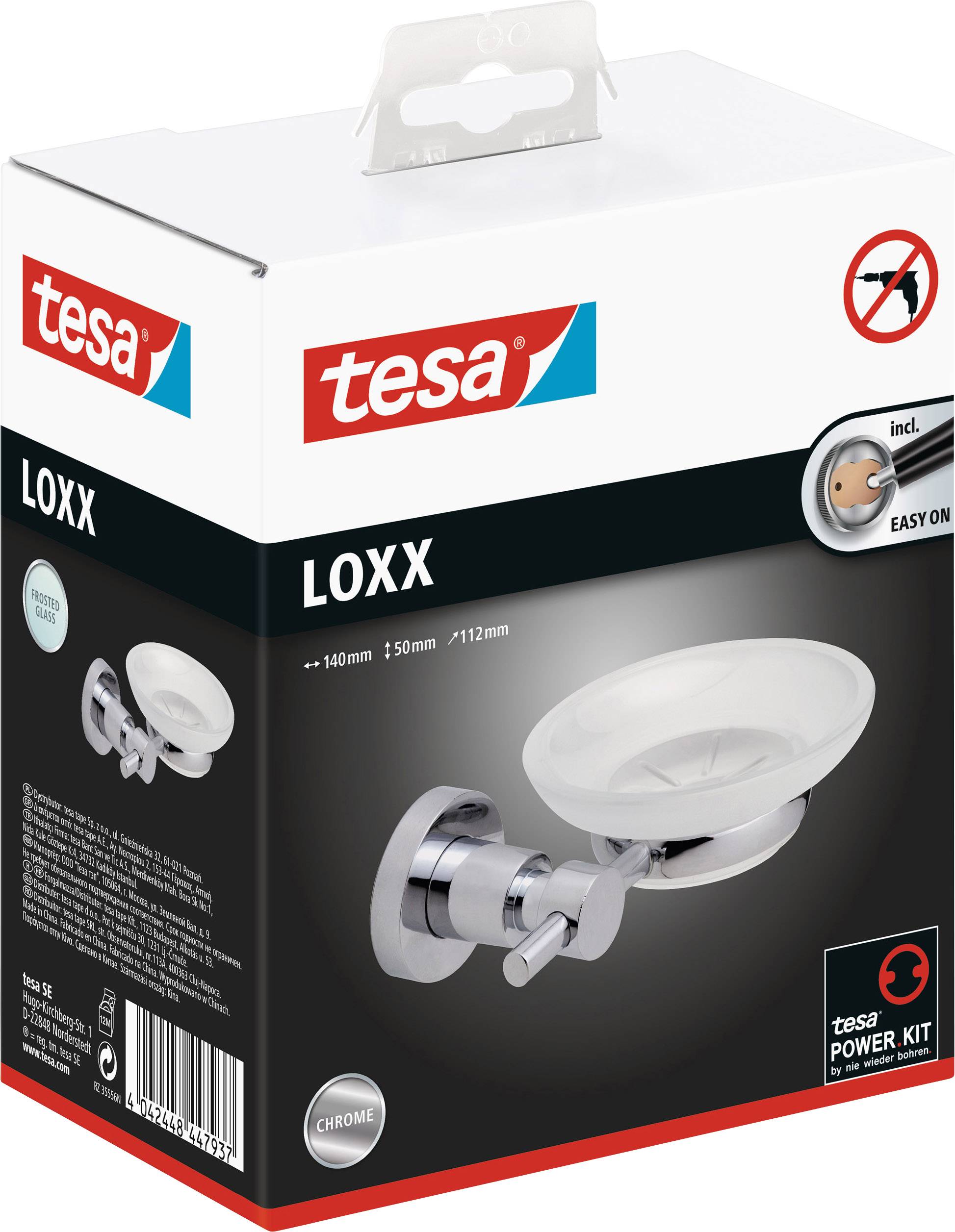 Förpackning för tesa LOXX tvålkopp, krom, med Power.Kit fästsystem. Innehåller bild av tvålkoppen och tesa-logotypen.