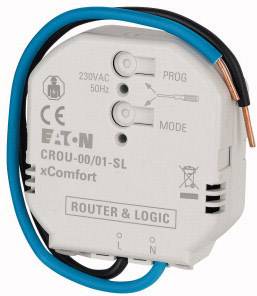En vit omkopplingsaktor med blå och svarta ledningar. Påskrift: 'EATON CROU-00/01-SL xComfort'. Etiketter: '230VAC', '50Hz', 'PROG', 'MODE'.