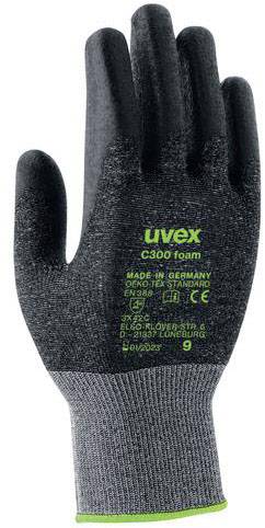 Skyddshandske i svart textil med grå handflata och grön text 'uvex C300' ovanpå. Lämplig för industriarbeten.