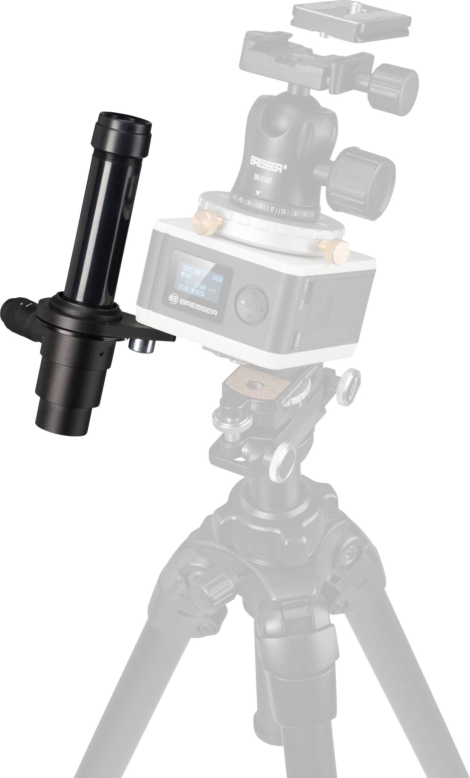 En digital kamera på ett stativ, utrustad med ett teleskopiskt tillsats monterat på sidan för astronomisk fotografering.