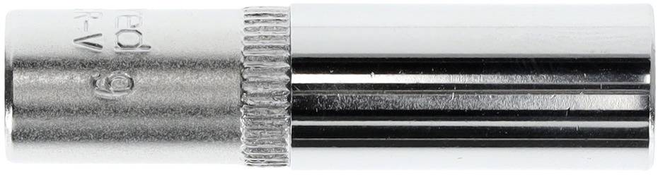 En silvrig metallbit, troligen ett verktyg, på vit bakgrund.