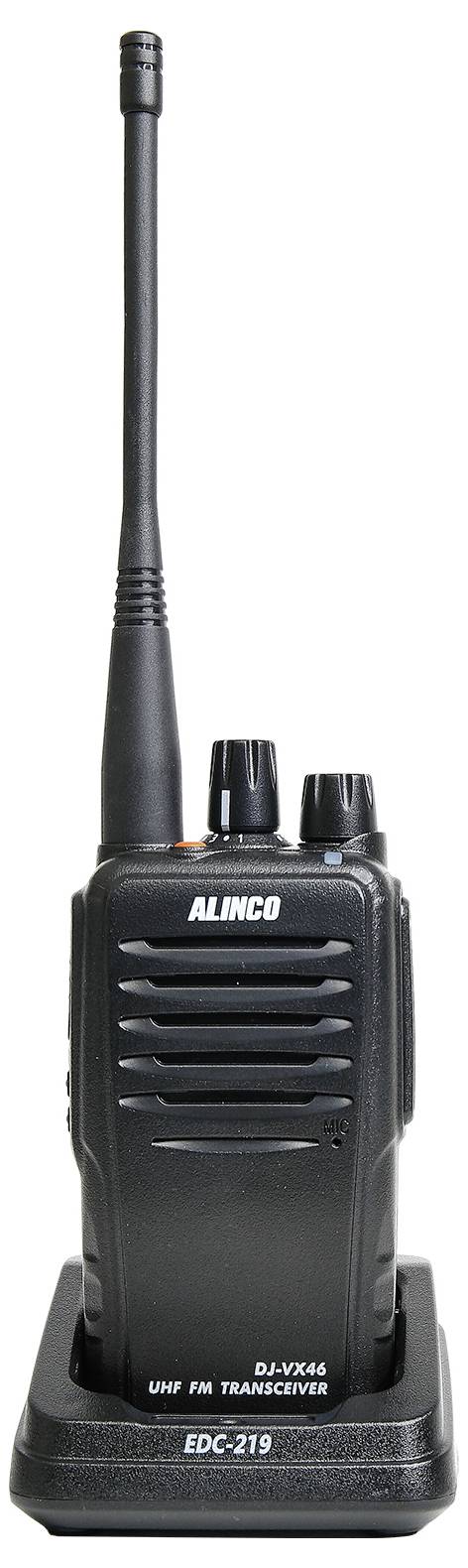 En bärbar radioapparat av märket Alinco, modell DJ-VX46, står i sin laddningsstation. Idealisk för professionell kommunikation.