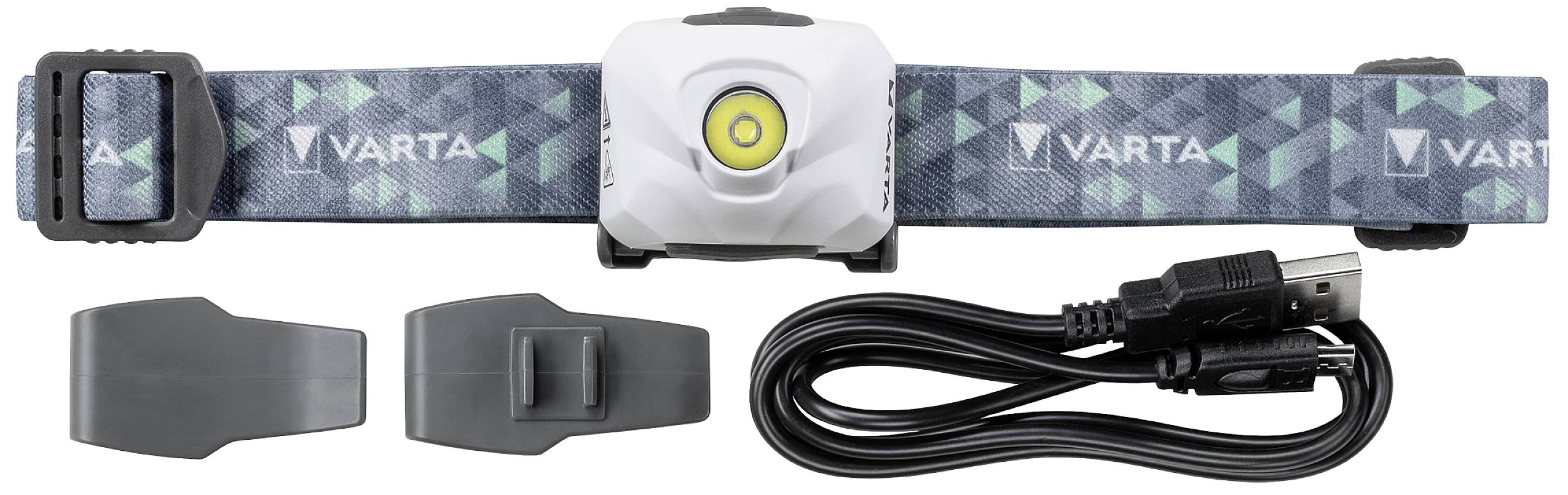 Pannlampa från Varta med pannband, två fästen och USB-laddkabel, avbildad på vit bakgrund.