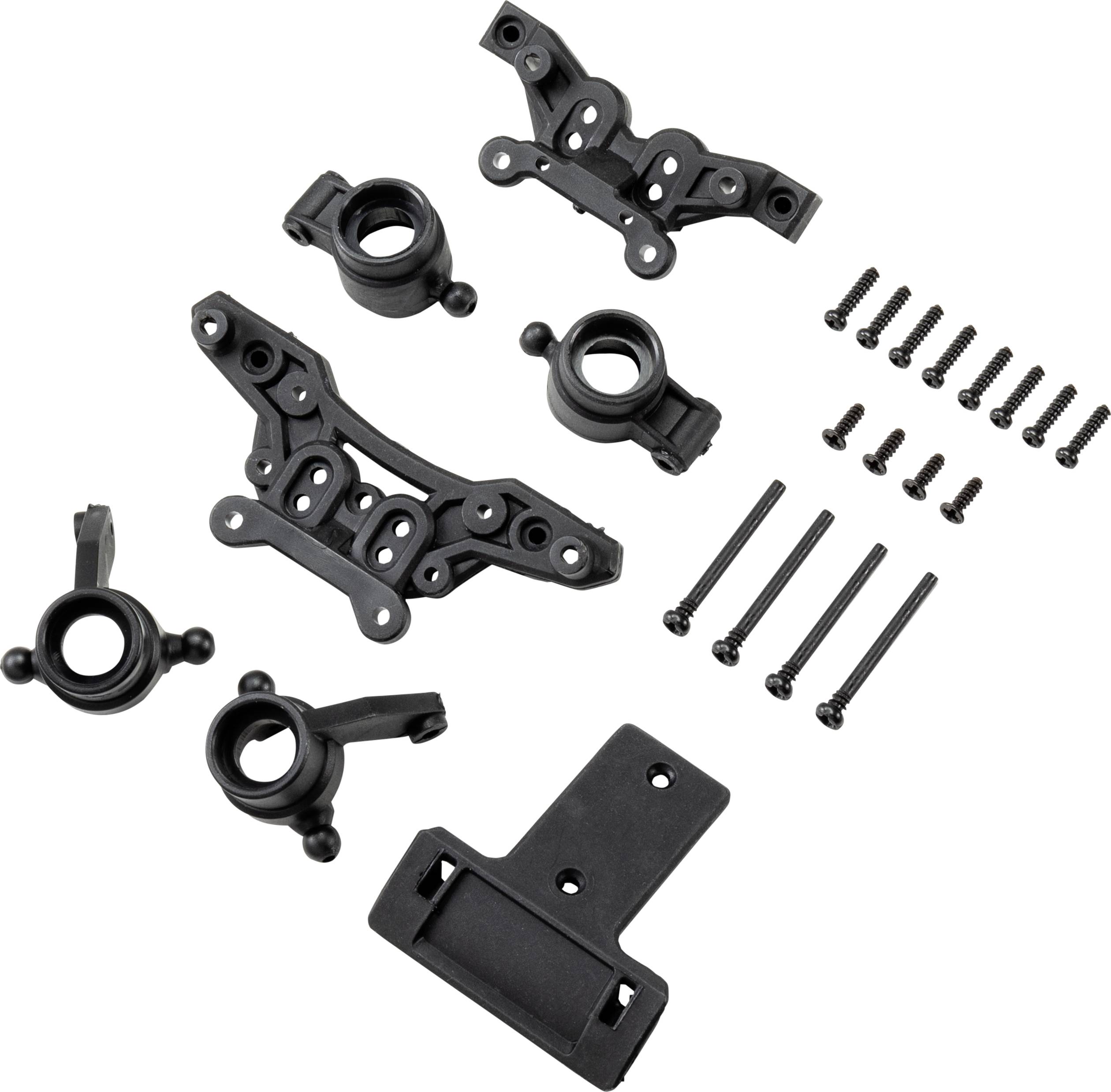 Svarta plastdetaljer och skruvar från en modellbyggsats, sannolikt för hjulupphängningen på en modeldbil.