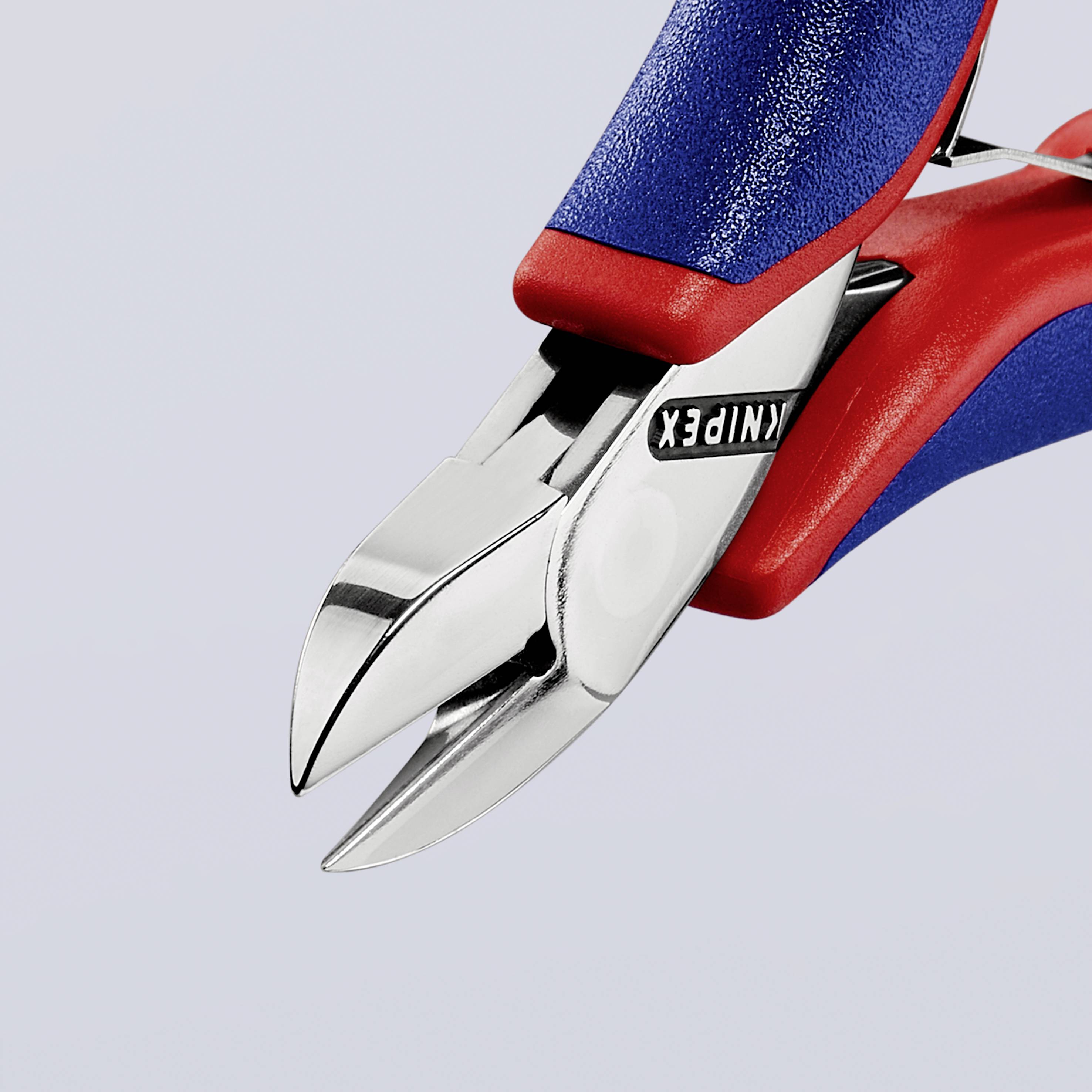 Vinklade avbitartänger med röd och blå handtag, KNIPEX-logotypen är synlig.