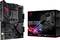 Moderkort Asus ROG Strix B550-F Gaming bredvid sin förpackning, svart design med röda accenter, lämpligt för speldatorer.