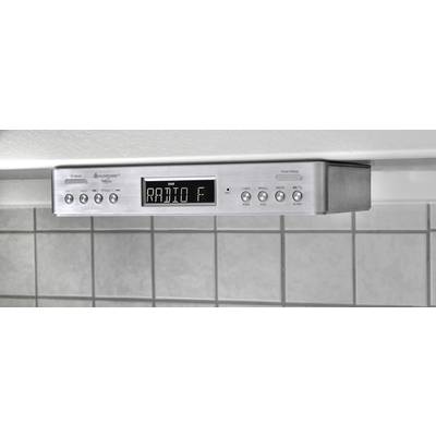Inbyggt köksradio med digitalt display som visar 'RADIO F'. Kontrollknappar för volym, stationsval och funktioner nedanför.