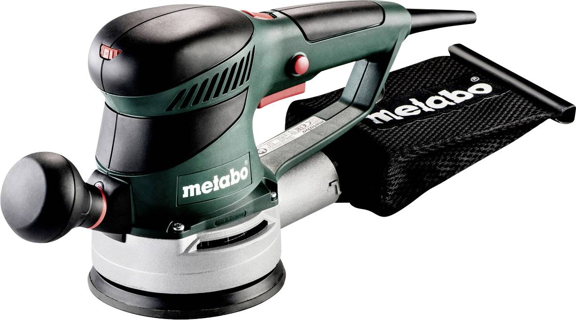 Grön Metabo handslipmaskin med slumpmässig orbitalrörelse, dammväska och sidohandtag på vit bakgrund.