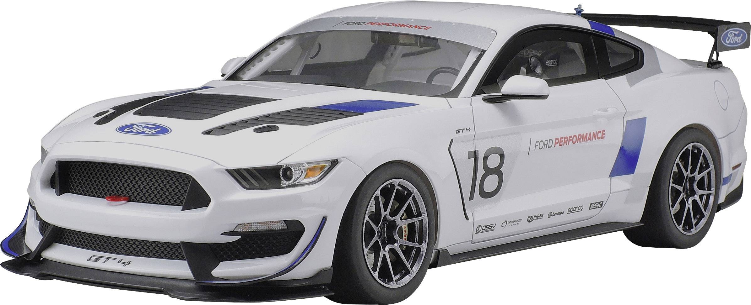 En vit racerbil med nummer 18 och 'FORD PERFORMANCE' text. Den har racerränder och är optimerad för motorsport.
