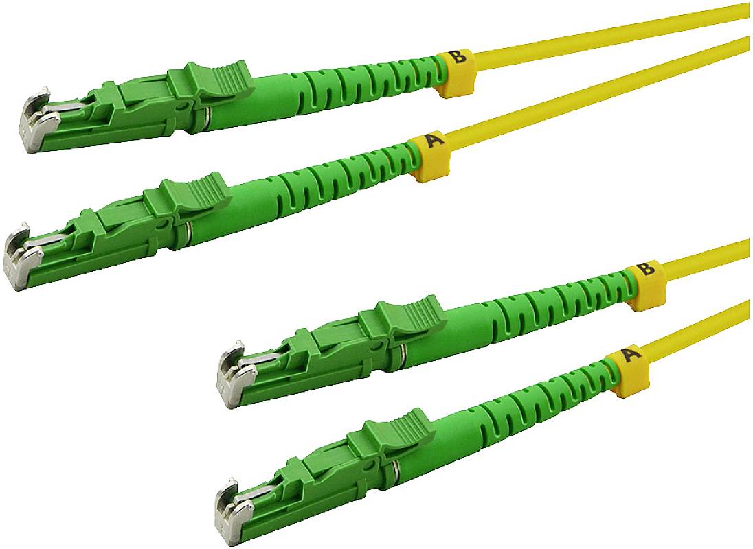 Fyra gula glasfiberkablar med gröna kontakter, märkta med 'A' och 'B'.