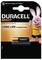 Duracell MN27-batterpaket med en rosa kanin-maskot. Texten lyder "Long Life Guaranteed." Batteriet visas under masköten.