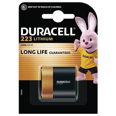 Duracell 223 litiumbatteris förpackning med en rosa kanin-maskot. Förpackningen betonar "Långt batteri liv garanterat."