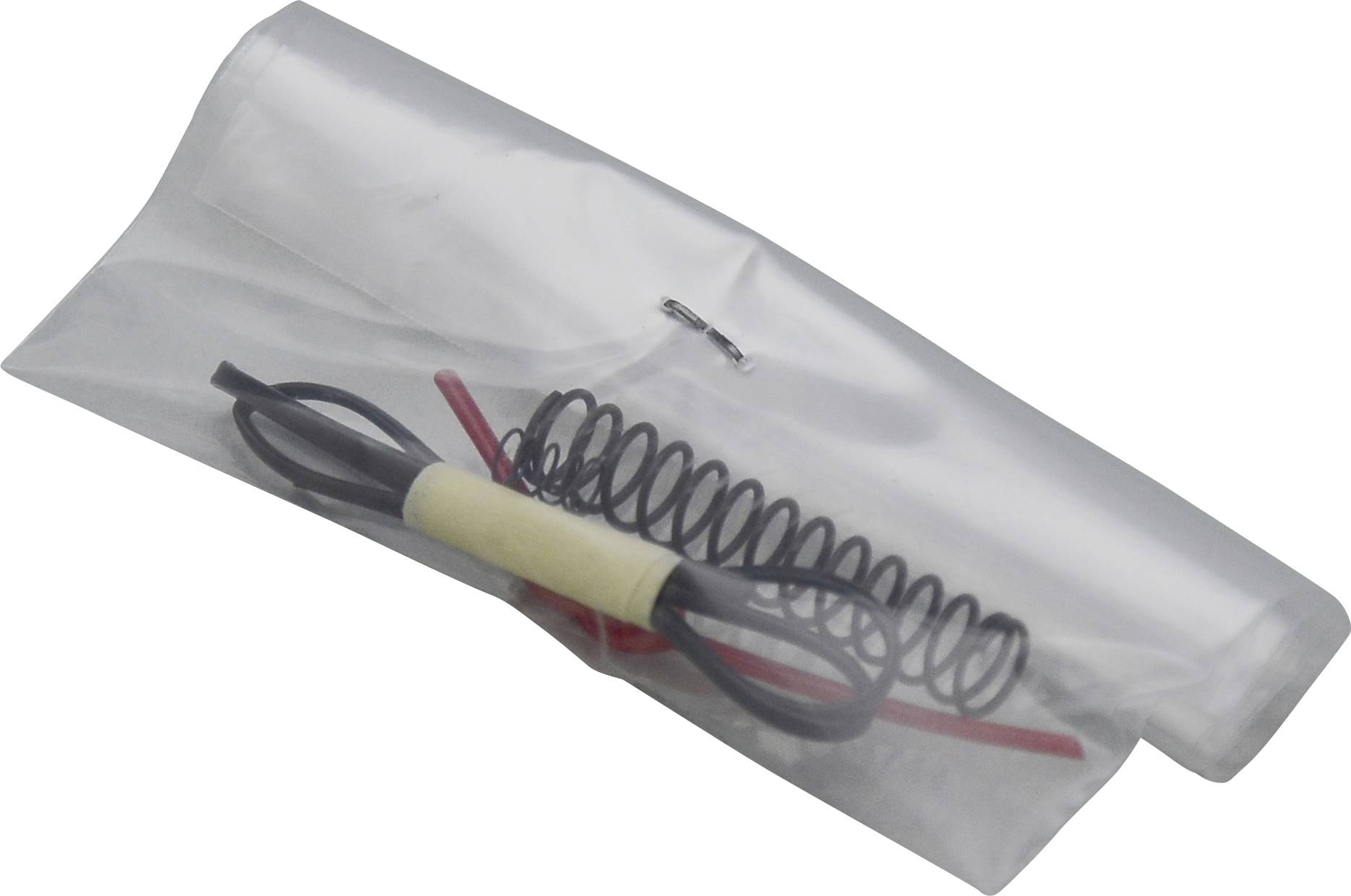 En uppsättning fjädrar och trådar i en genomskinlig plastpåse, hoprullad med ett vitt band.